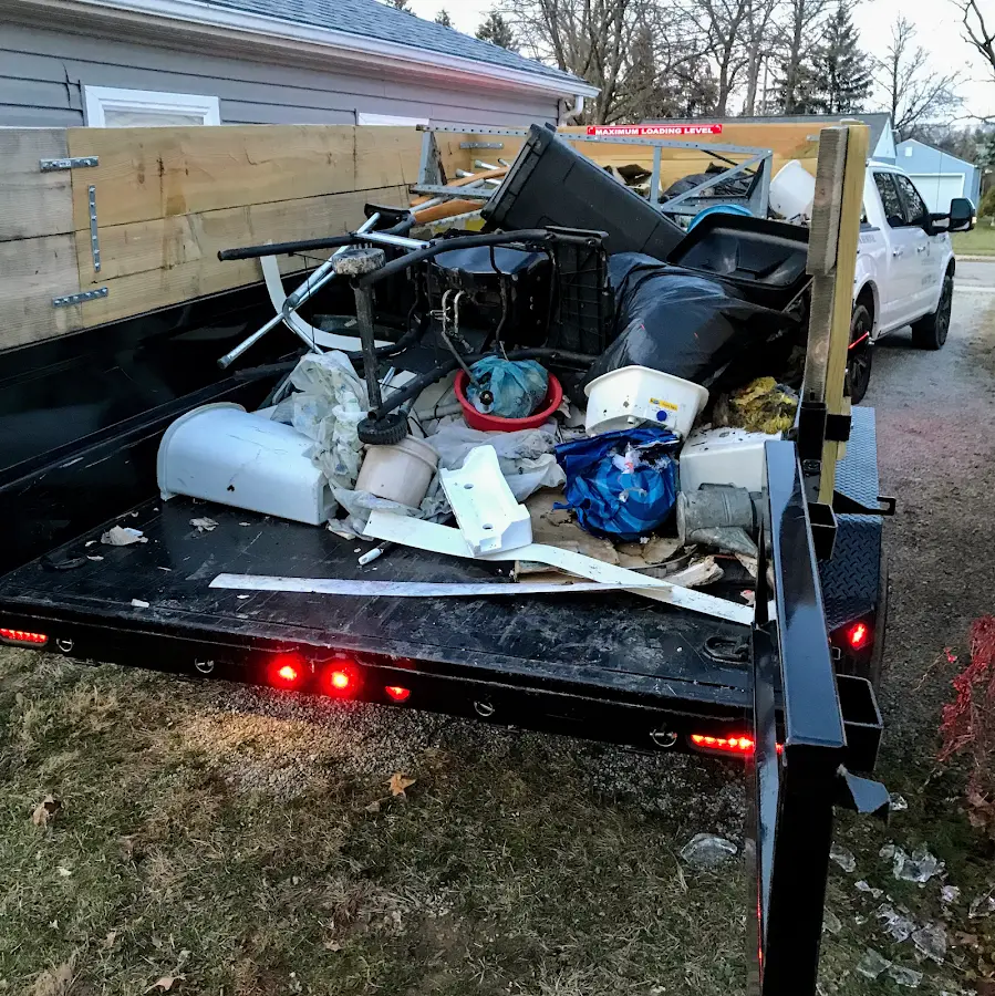 Roll-off dumpster delivered to a residential driveway in San Gabriel